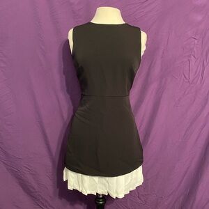 Commense Black Sleeveless Mini Dress with White Ruffle Hem. Size M.